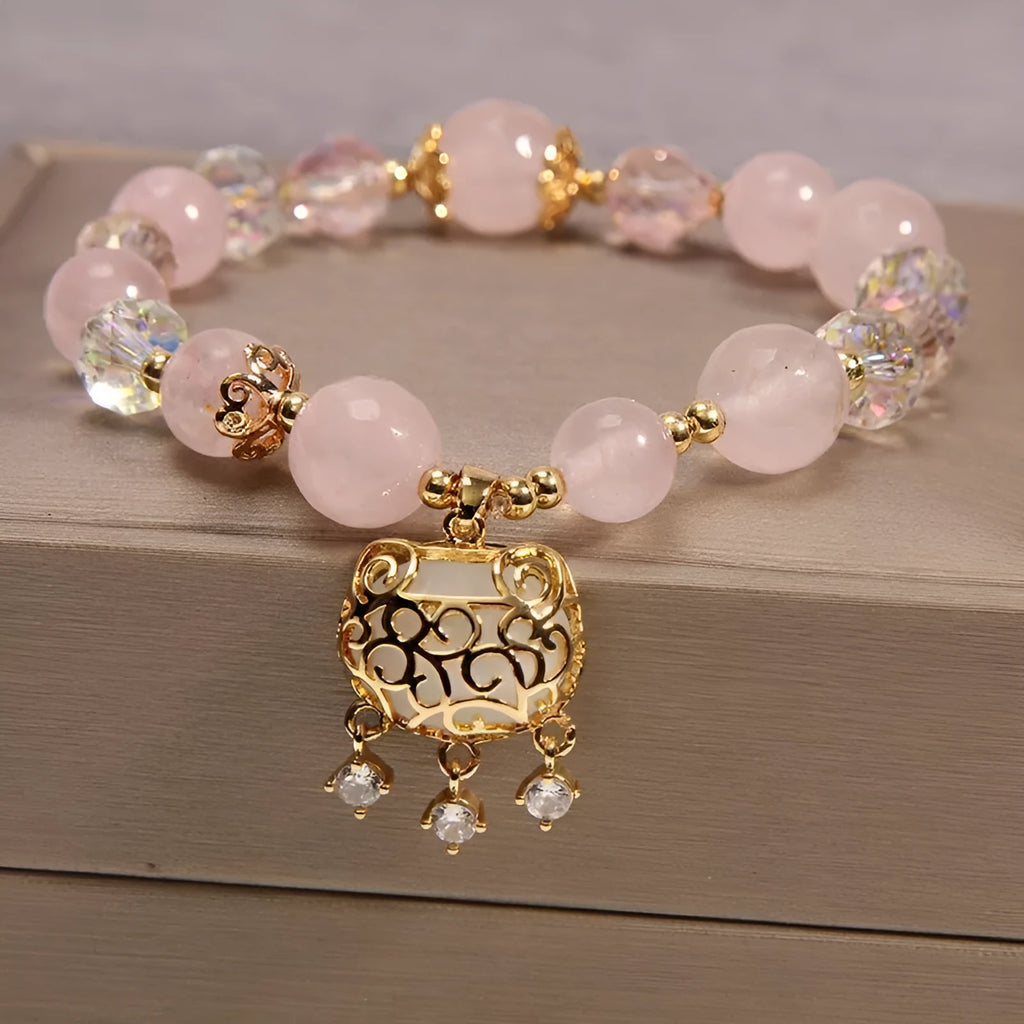 Yellow agate crystal bracelet with gold silk threading on wrist