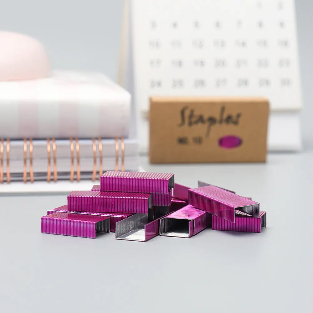 Box of 1000 metal staples in black, purple, rose gold, and rose red colours