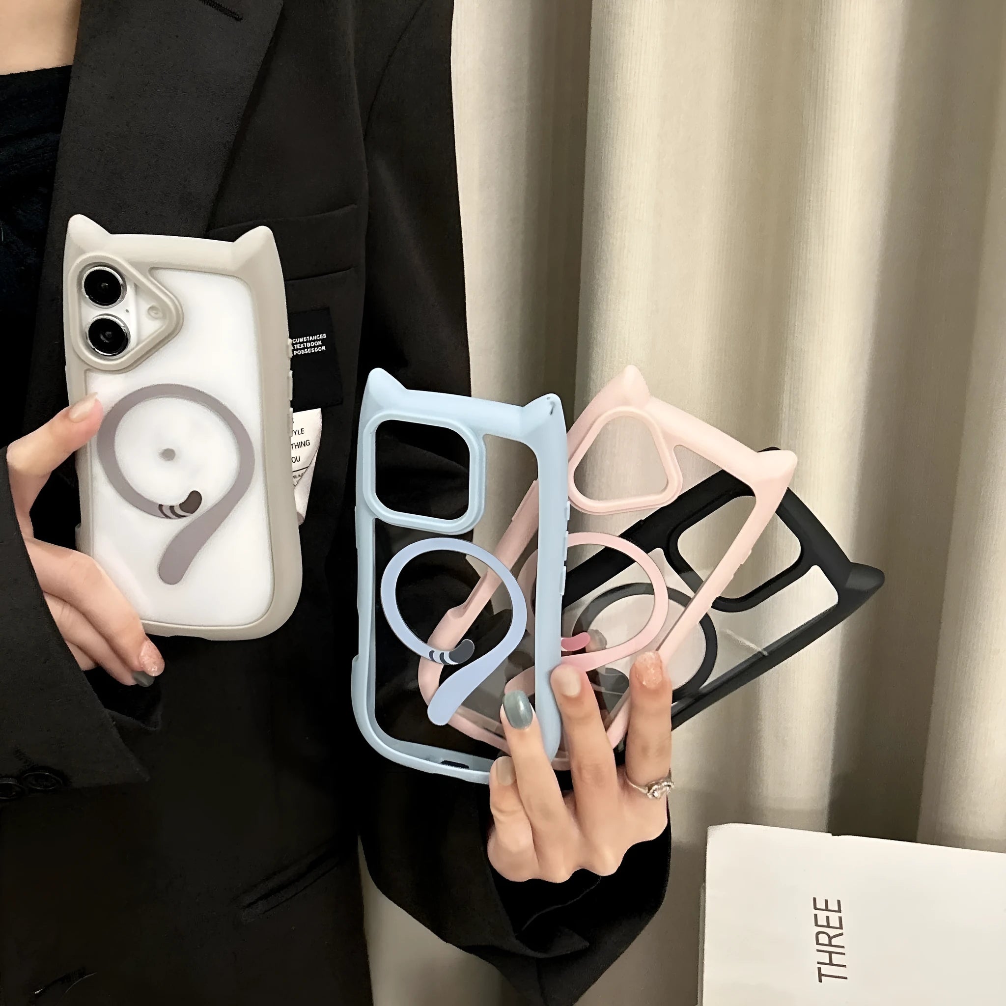 Clear acrylic and TPU phone case for iPhone 17 Pro Max showing magnetic ring and transparent design.