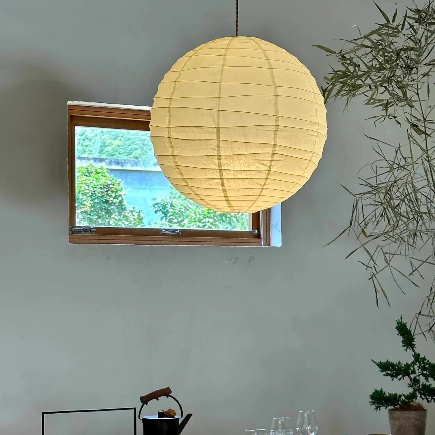 Japanese-style rice paper ball pendant chandelier in living room setting