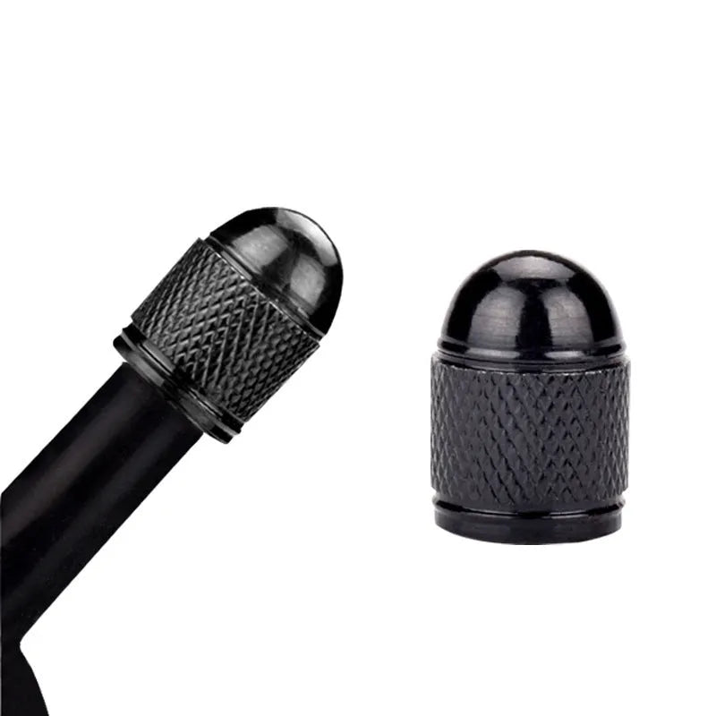 Anodised aluminium mountain bike tyre valve cap in one of five colours: black, blue, gold, red, or silver.