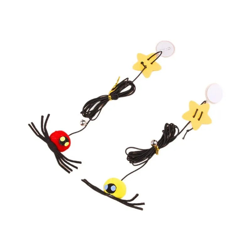 Red and yellow hanging door cat toy with swinging elastic rope, feather, and bell attachments