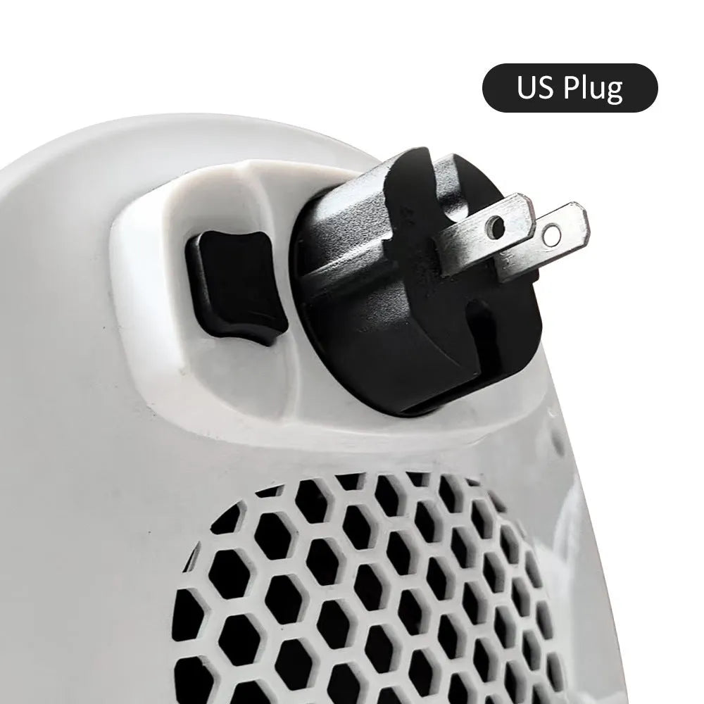 White ceramic electric air heater with remote control on a table.