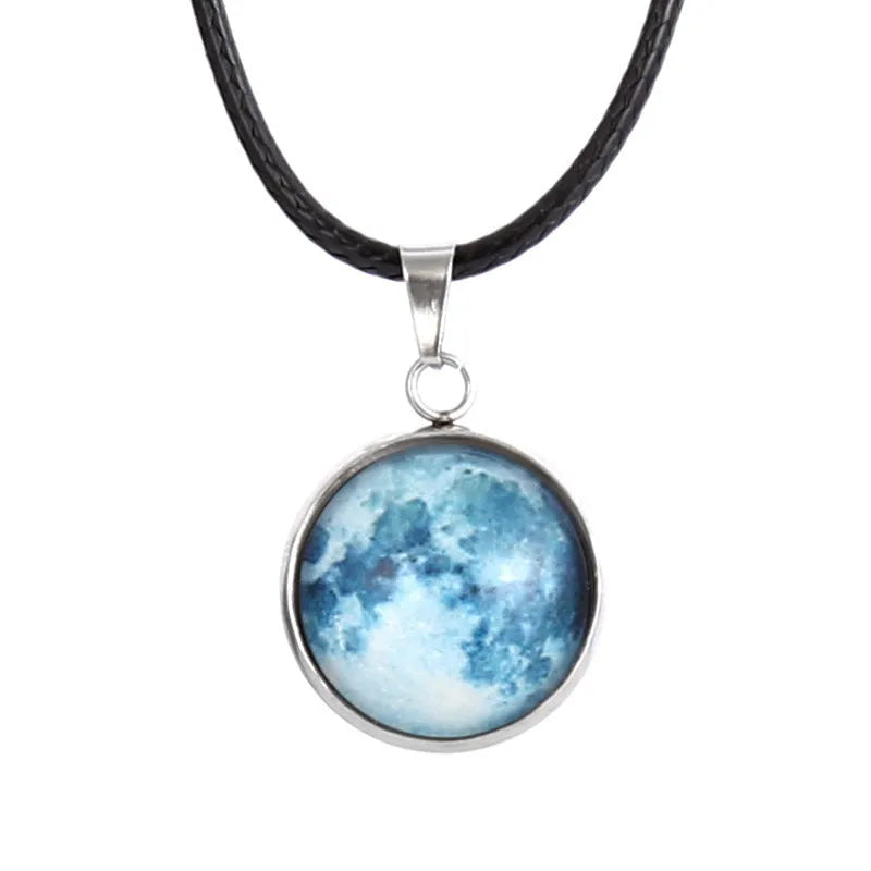 Constellation night sky pendant necklace with luminous alloy and organic glass on an adjustable chain.