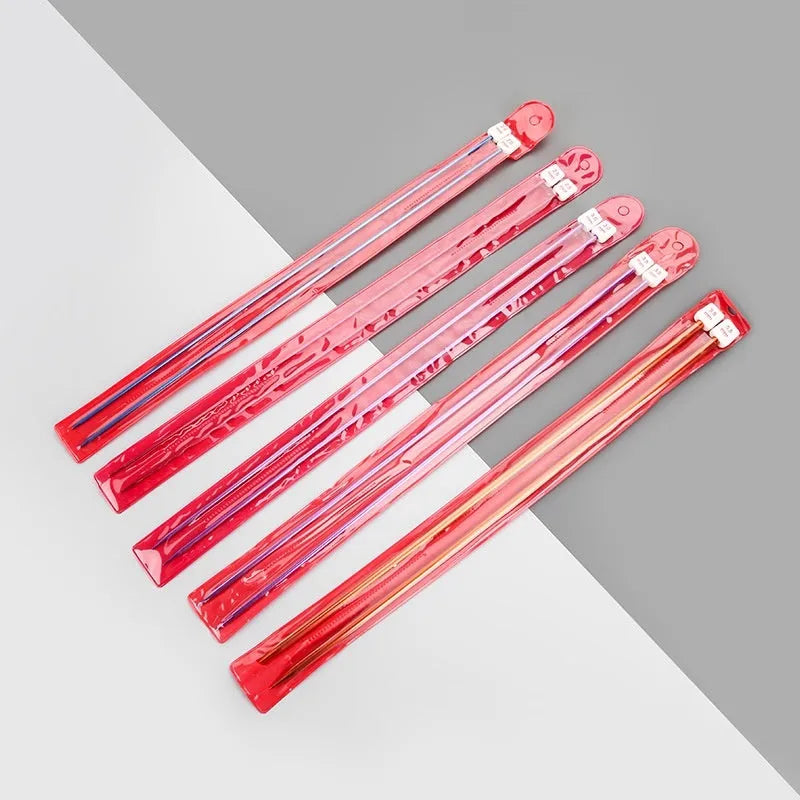 Set of lengthened crochet hooks in thirteen sizes from 2.0mm to 10.0mm, each with a protective end cap.