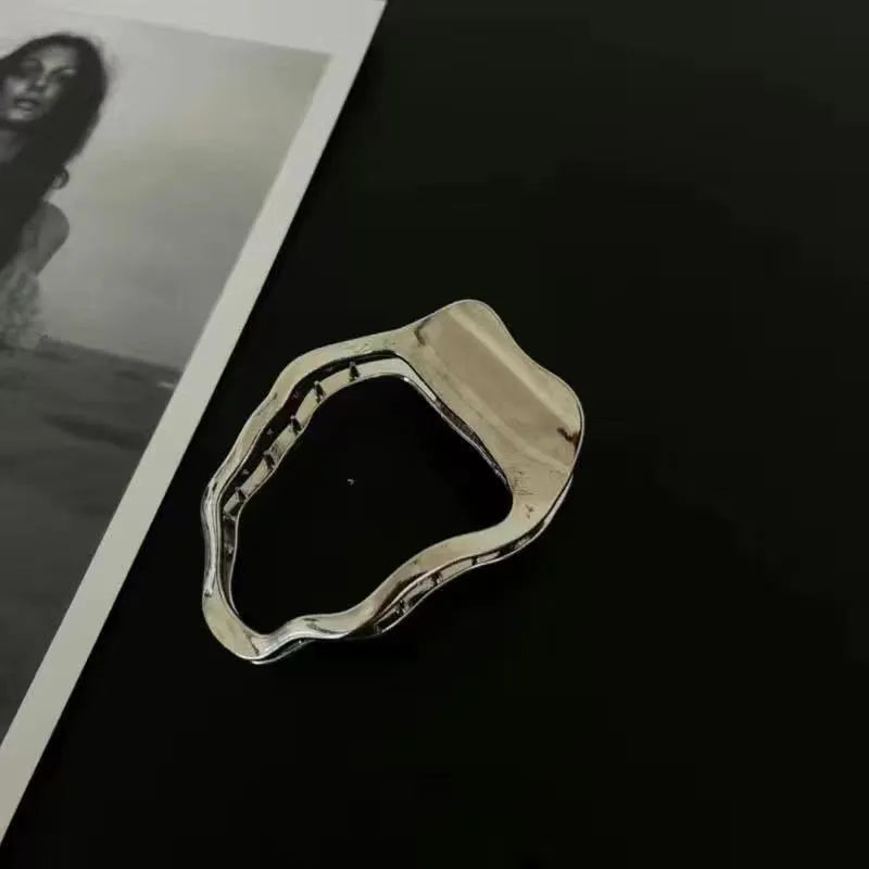 Gold and silver zinc alloy hair barrettes in square, arc, and triangle shapes.
