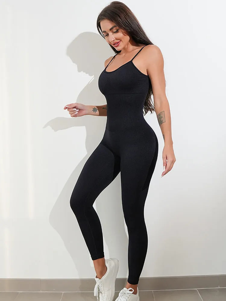 Women's black unitard jumpsuit with spaghetti straps and tummy control design