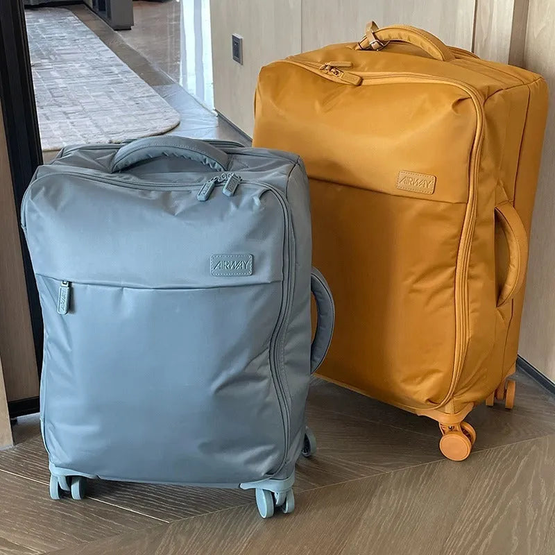 20-inch ultra-light waterproof Oxford cloth suitcase in bluestone green with universal wheels