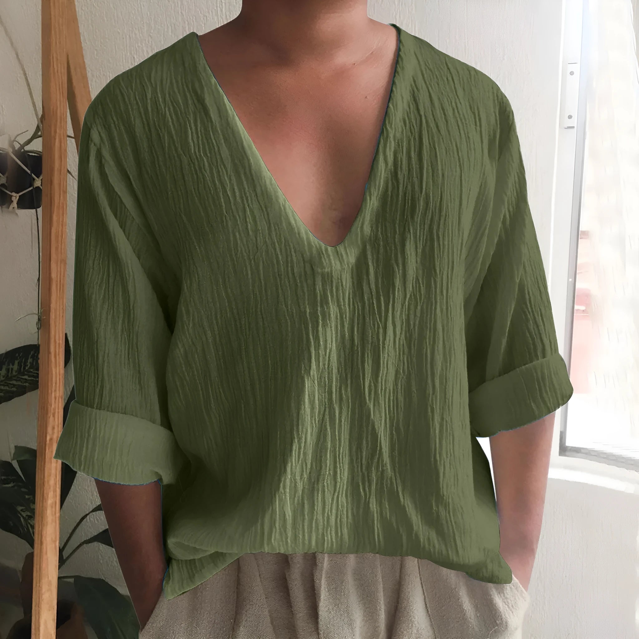 Men's long sleeve V-neck T-shirt in washed cotton showing solid colour options