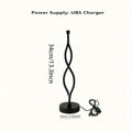 Black aluminium desktop table lamp with dimming button and touch controls.