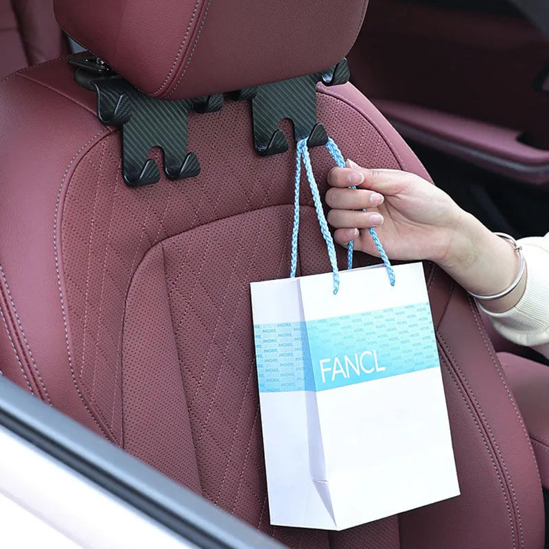 Black car hook and mobile phone bracket for rear seat storage organisation