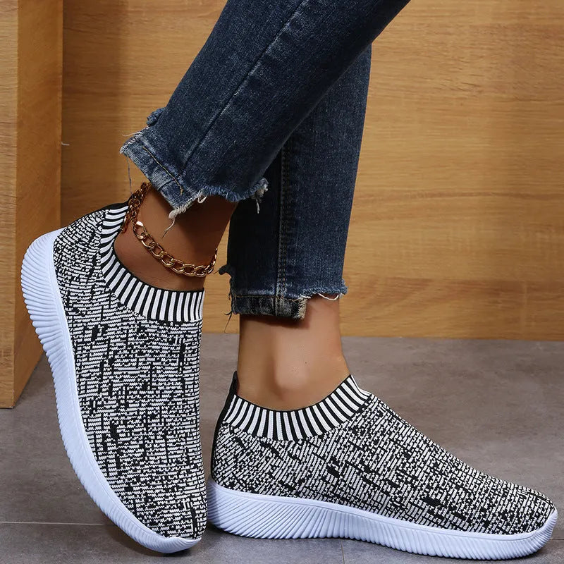 Unisex stripe knit sock shoes in white with low-top design and EVA sole for running and walking