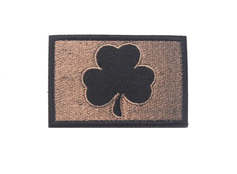 Outdoor embroidered fabric badge with velcro strip backing in green colour options.