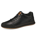Men's white leather casual trainers with round toe and flat heel on size chart