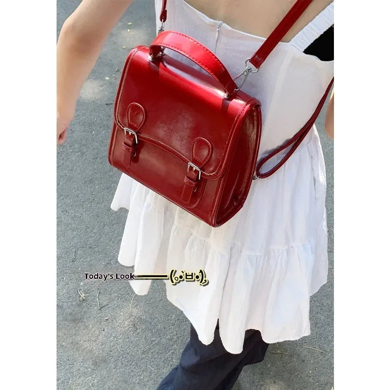 New simple college-style all-matching PU backpack in black with sewing thread detail