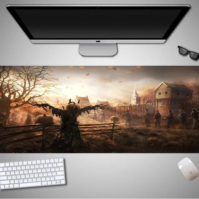 Halloween-themed oversized mouse pad with non-slip rubber cloth backing on a desk