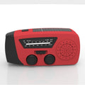 Red rechargeable hand radio torch with built-in speaker and USB interface, compact ABS body, emergency disaster prevention device