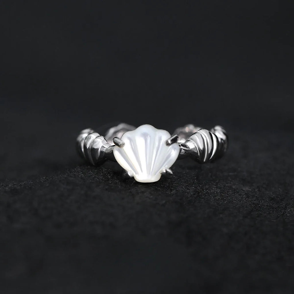 Women's adjustable silver ring with a shell design and set tiger eye gemstone in a gold colour finish.