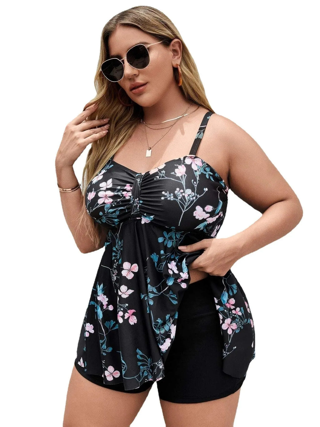 Women's floral print one-piece swimsuit with split colour design showing high elasticity fabric