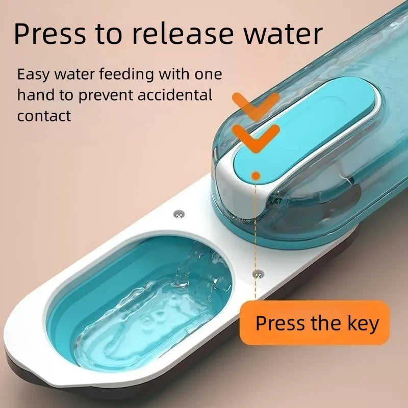 Portable blue pet water bottle with foldable silicone drinking bowl attached, shown with carabiner clip.