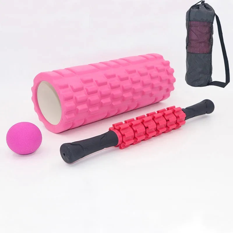 Black foam roller massage bar with gear-like segments, measuring 33cm in length