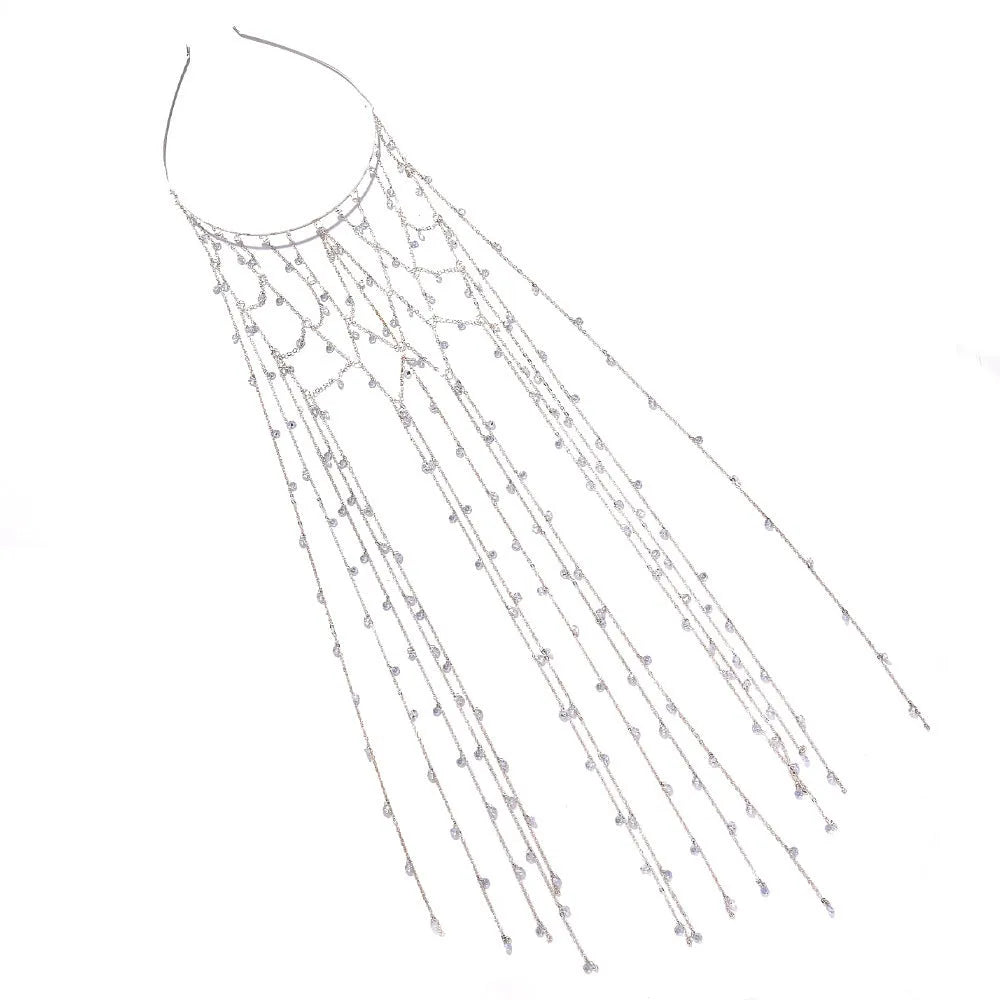 Gold metallic mesh hair band with rhinestone decorations on white background