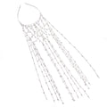 Gold metallic mesh hair band with rhinestone decorations on white background