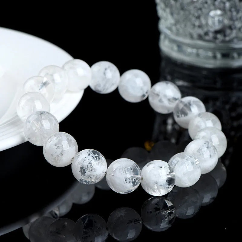 Women's crystal bracelet with natural blizzard snowflake round beads in geometric shape with Ruyi and Xiangyun design elements