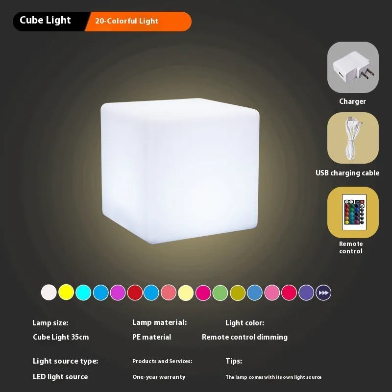Modern LED illuminated cube stool in outdoor garden setting showing waterproof construction and integrated lighting