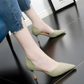 Women's black pointed-toe stiletto high heels with a stitched leather detail and rubber sole.