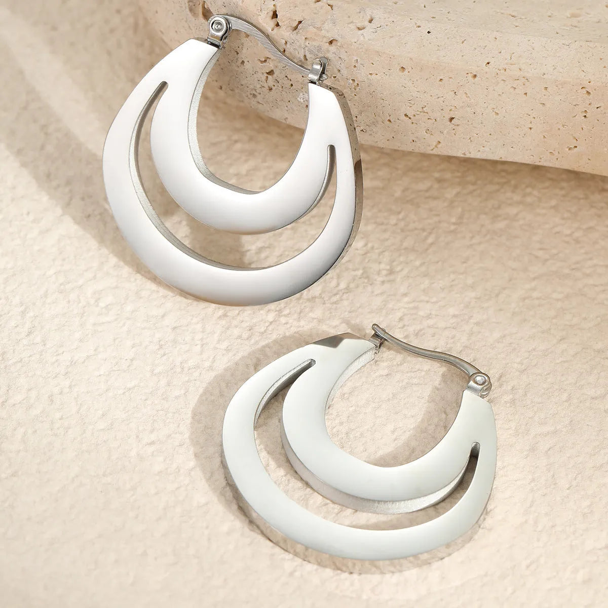 Geometric French earrings with round ring design in 18K gold-plated stainless steel, available in gold or steel colour finish