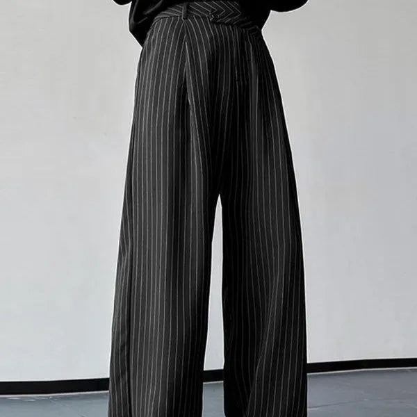 Black men's trousers with vertical stripes and pleated front design on elastic fabric