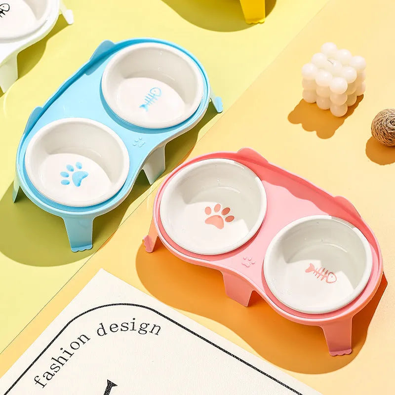 Ceramic cat food and water bowl set on elevated stand with hook design in blue colour
