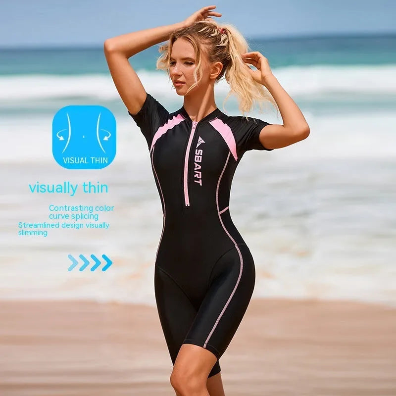 Solid colour women's one-piece surfing swimsuit with short sleeves and chest pad.