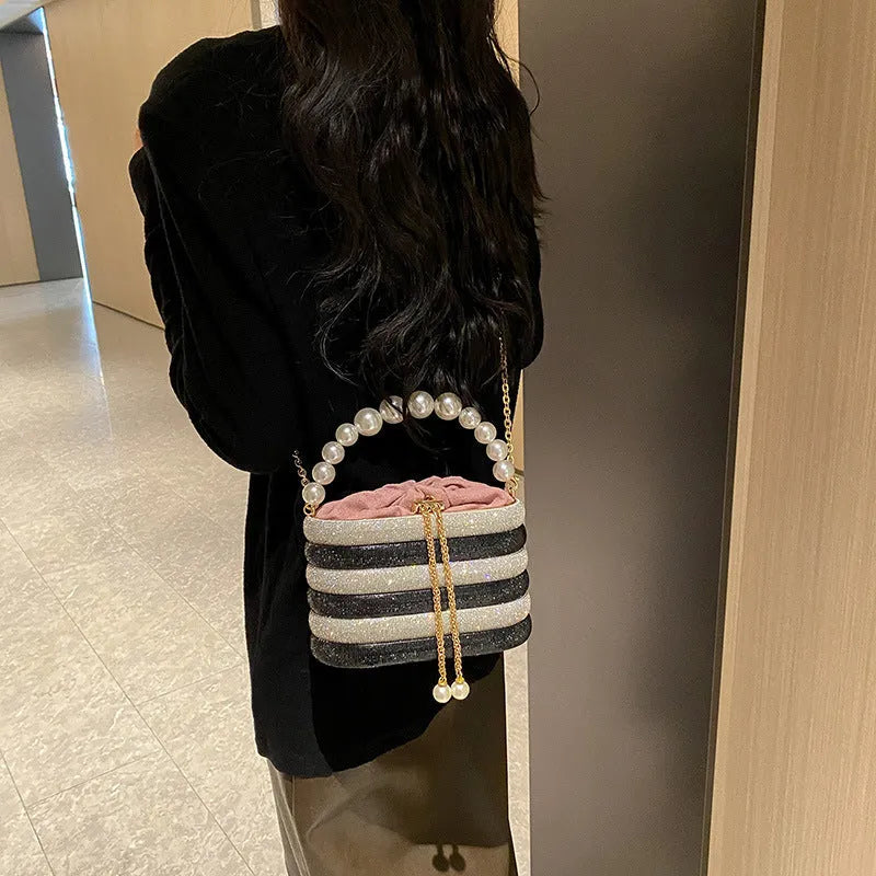 European retro style women's crossbody bag with beaded decoration and soft PU construction