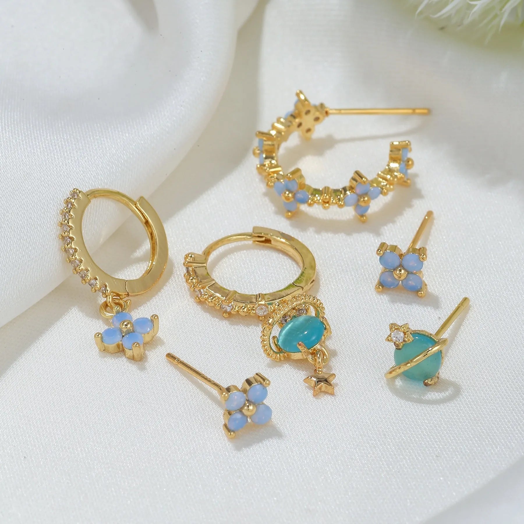 Japanese Korean style flower nail protein ear studs in gold or silver with zircon mosaic detailing