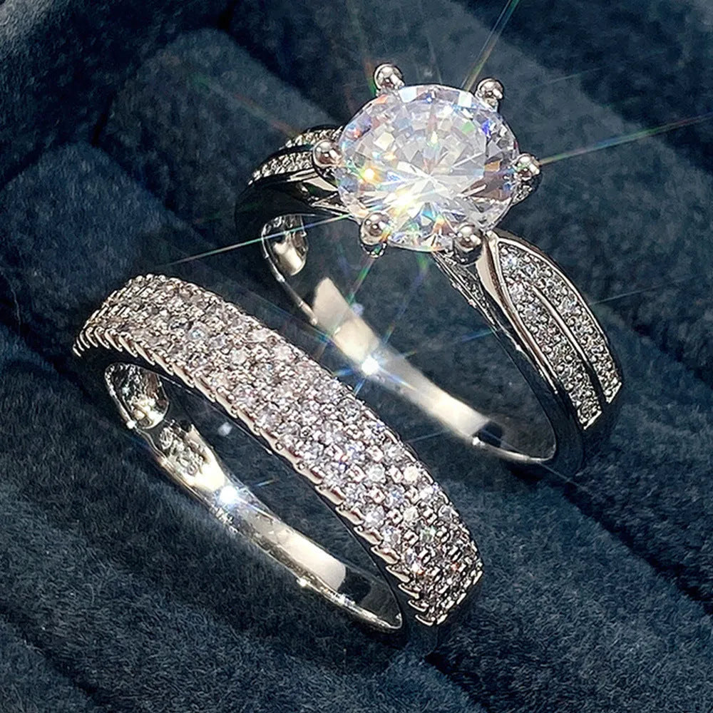 Geometric white gold colour wedding ring bracelet with round detail, shown in size options 5 to 11