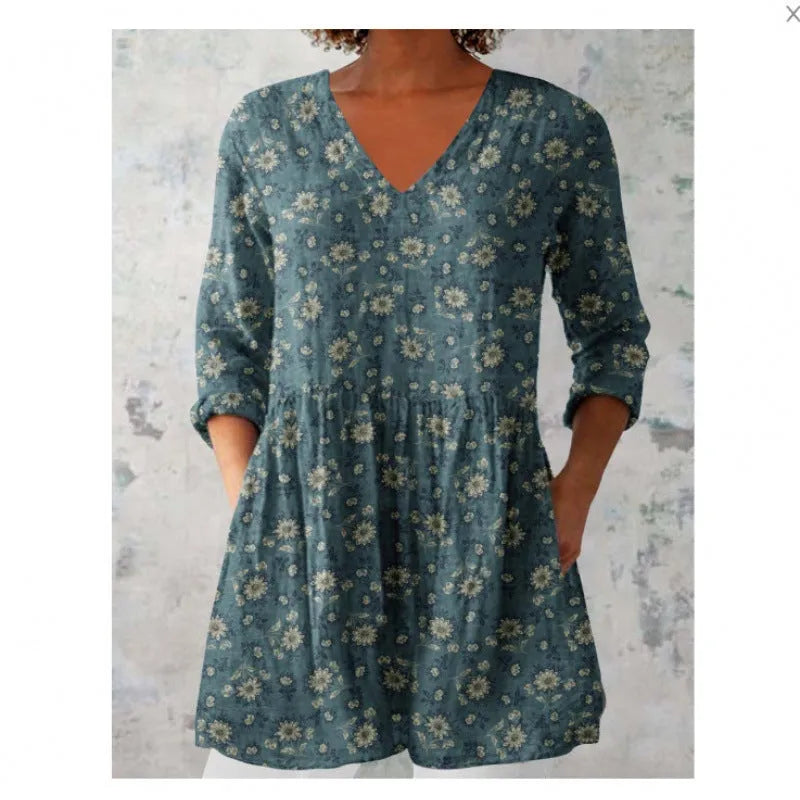 Women's printed loose dress with 3/4 sleeves and a wave skirt, shown in a variety of pattern styles.