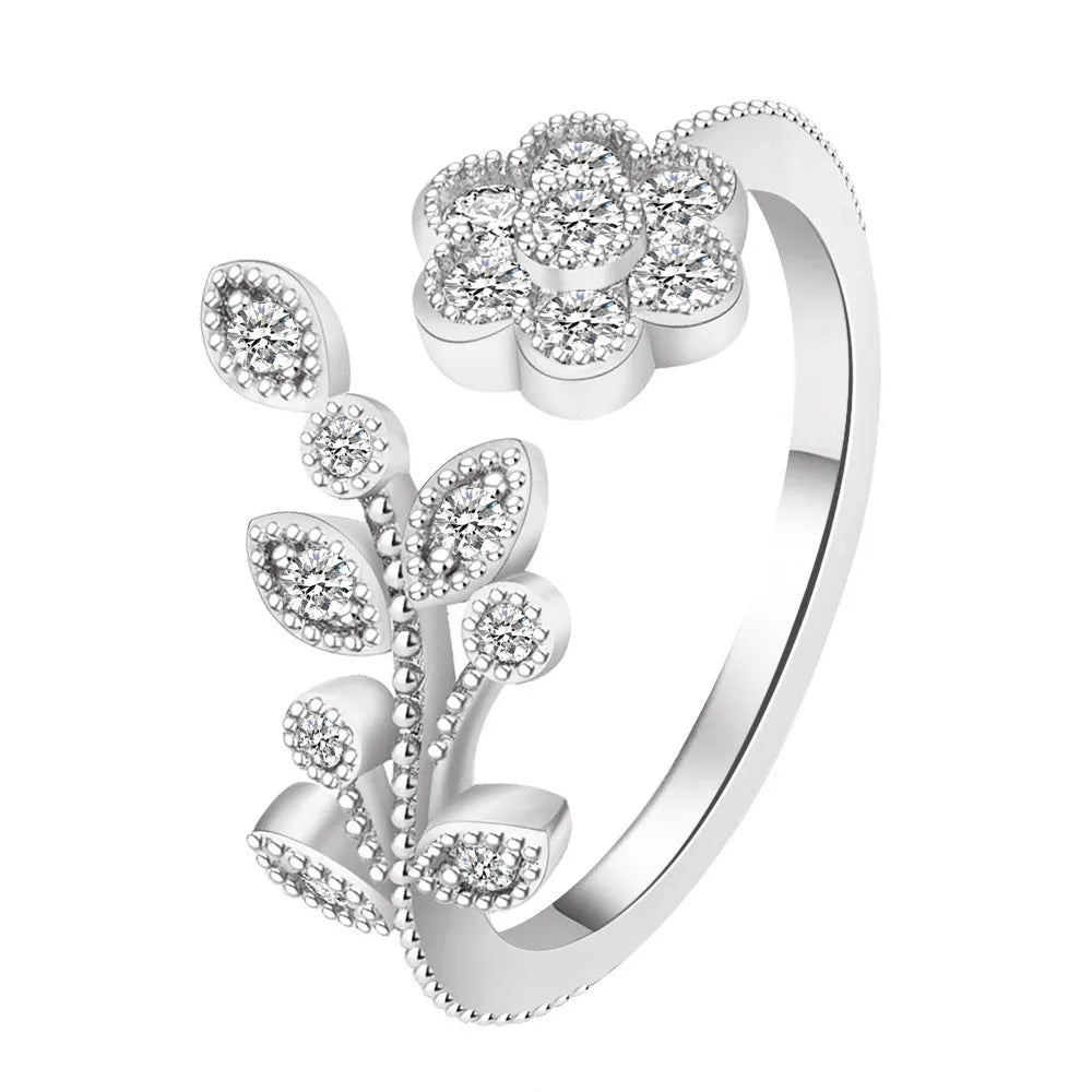 Women's open ring with floral leaf design in gold or white colour on copper