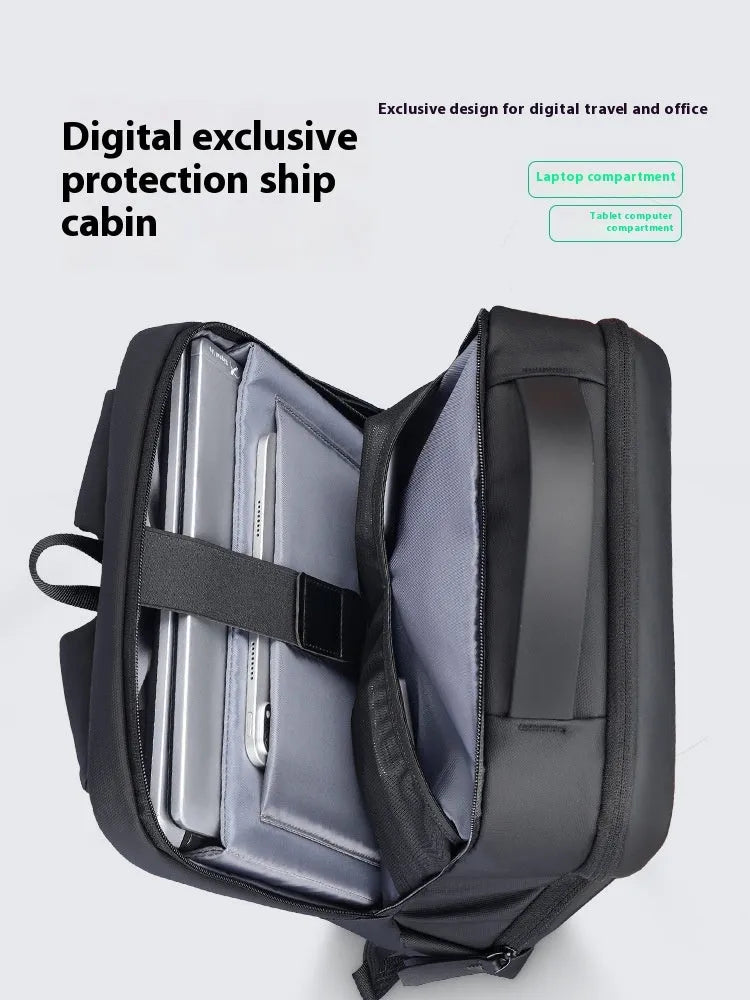 Graphite grey Oxford cloth business backpack featuring an external USB charging port on the shoulder strap.