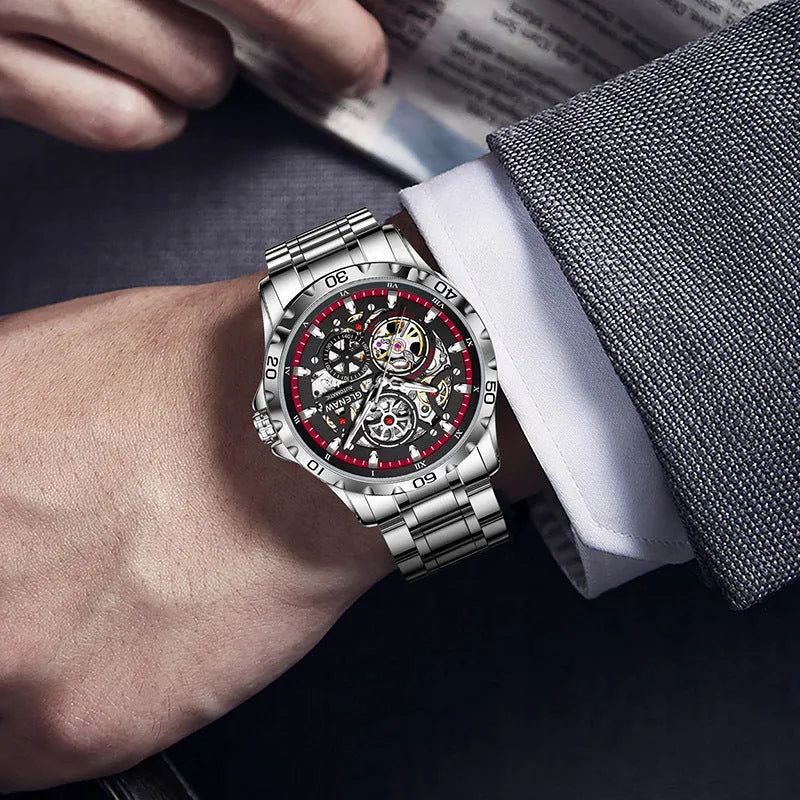 Men's silver mechanical watch with hollow-out dial showing movement and stainless steel strap