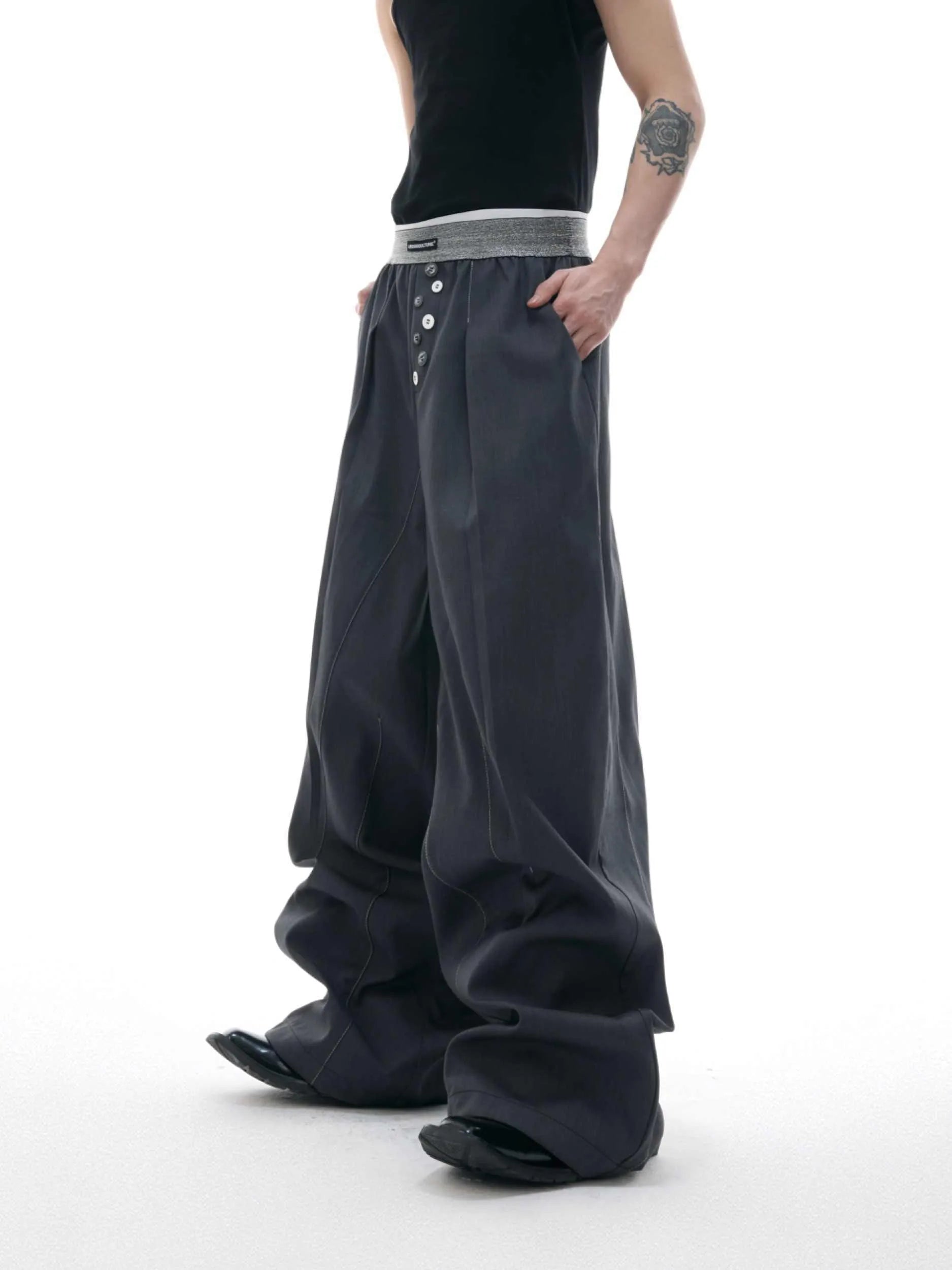 Straight-leg high-waist casual trousers with button-fly design in black or grey colour
