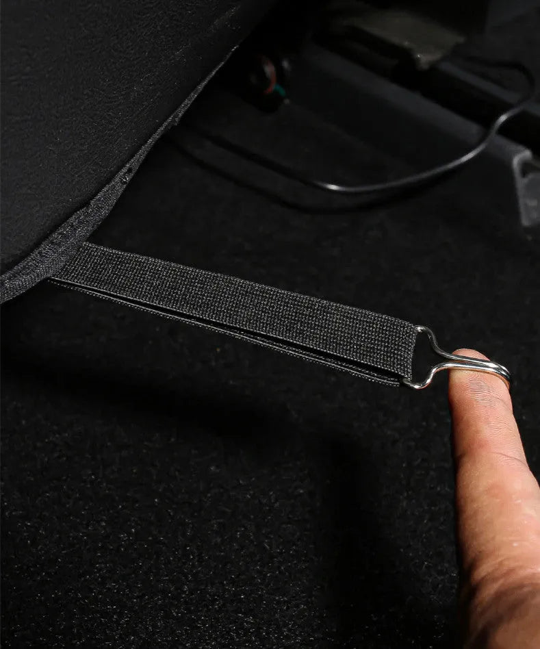 Black leather car seat kick pad measuring 68cm by 42cm, shown as a rear seat protector.