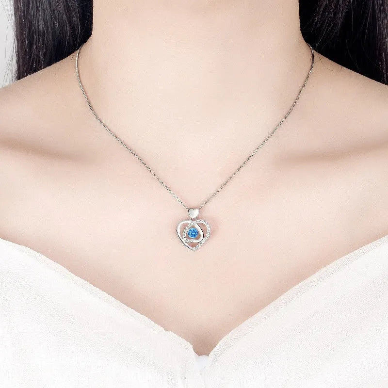 Blue diamond heart pendant necklace and matching bracelet set with geometric design on copper with electroplated finish