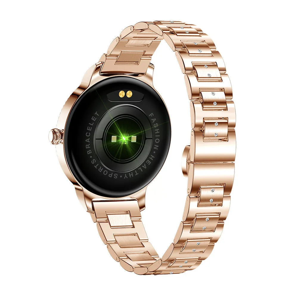 AK38 ladies smart watch with stainless steel band showing on wrist, screen displaying time.
