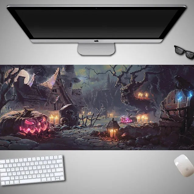 Halloween-themed oversized mouse pad with non-slip rubber cloth backing on a desk