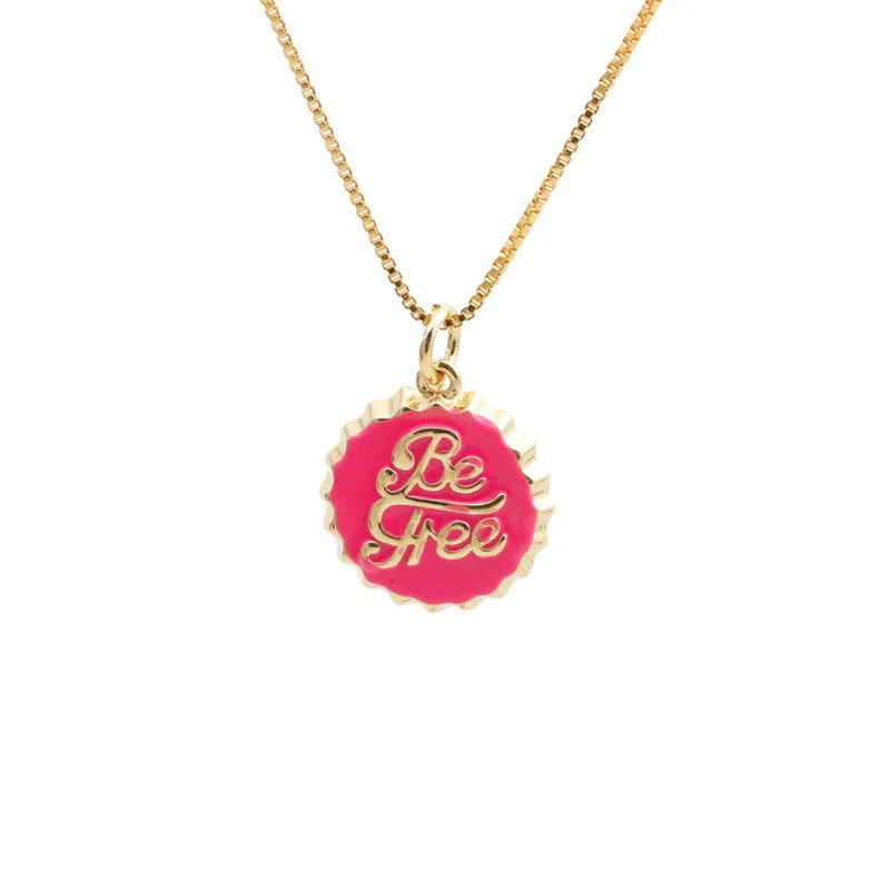 Copper bottle cap pendant necklace with 18k gold electroplating on a box chain, shown in one of six available colours.