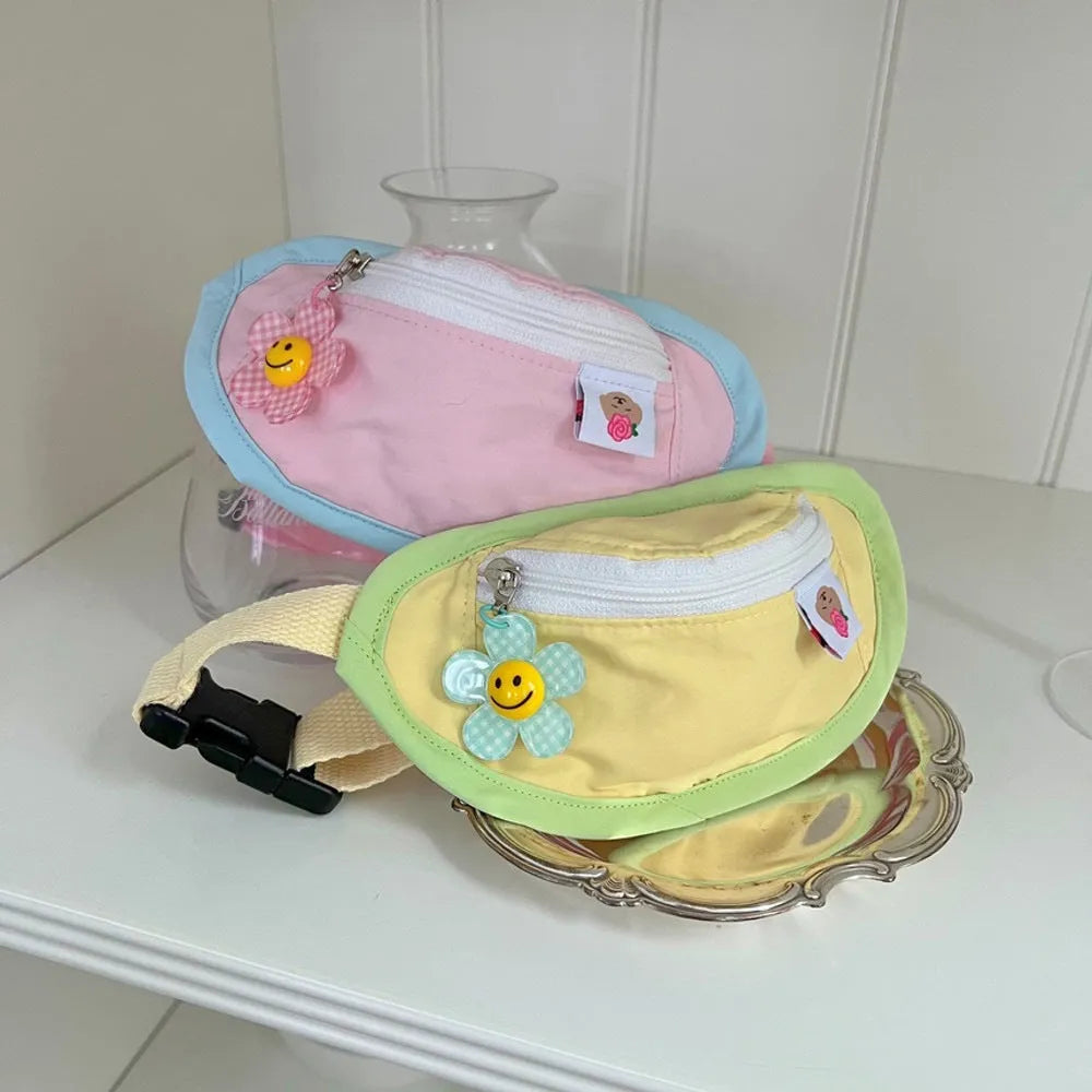 Powder blue messenger-style backpack for dog poop bags on an adjustable strap.