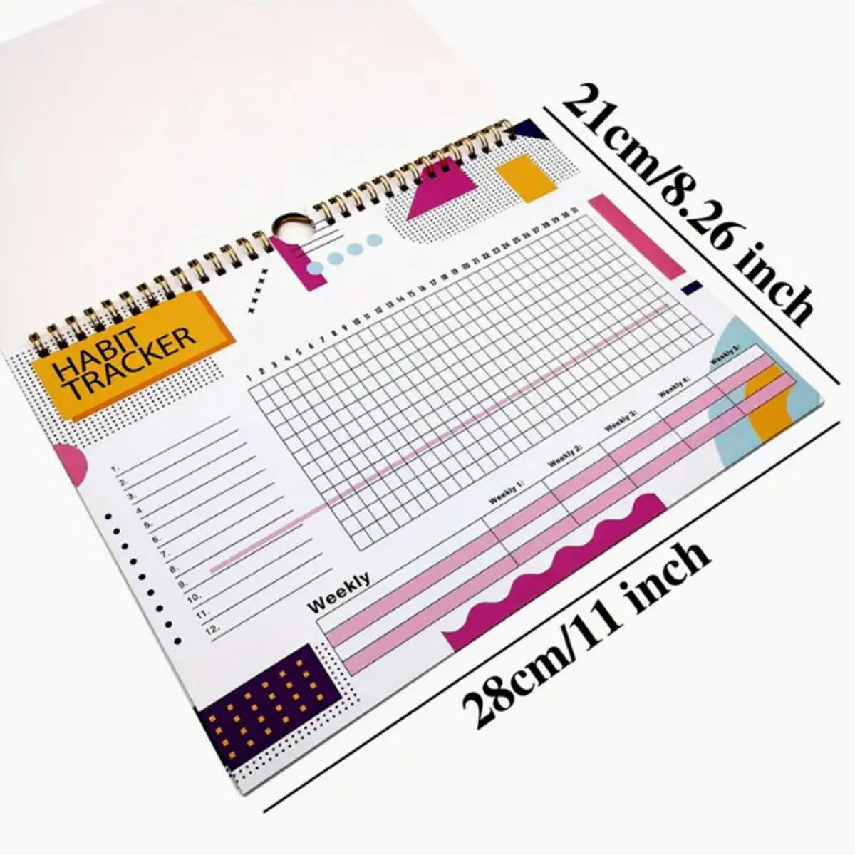 Habit tracking journal open showing internal pages with 21x28cm dimensions and coloured cover
