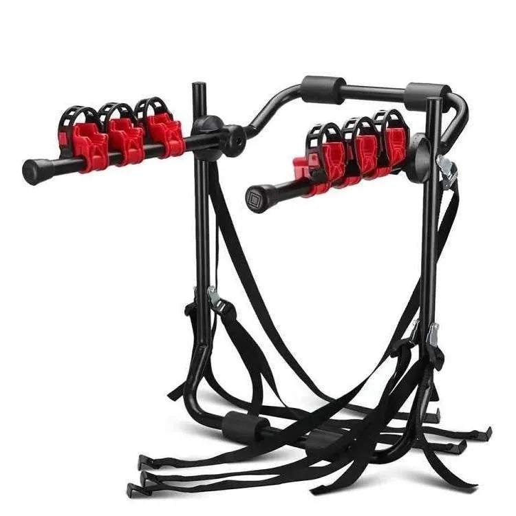 Black and red iron-framed car boot bike rack with tie rope fastenings.